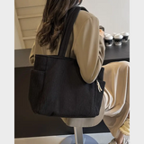 Amalija – Gestreifte Tasche mit Details aus Seil