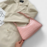 Bernarda - Glänzende Lederhandtasche