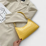 Bernarda - Glänzende Lederhandtasche