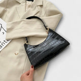 Bernarda - Glänzende Lederhandtasche