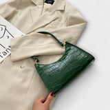 Bernarda - Glänzende Lederhandtasche