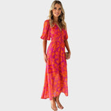 Ranka - Blumen-Midi-Kleid mit Puffärmeln und V-Ausschnitt